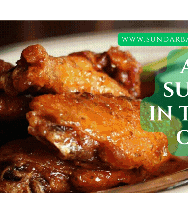 Delicious Sundarban food platter with fresh fish curry, crab dish, and mutton served in village style